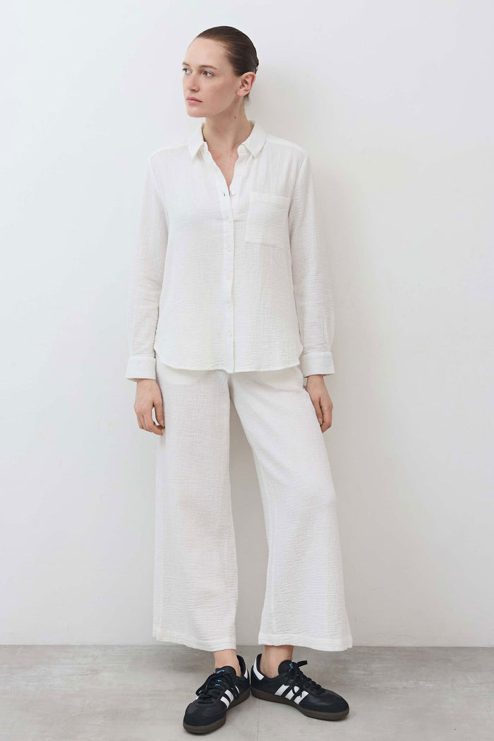 Airy button-down tunic in off-white with collared button front and chest pocket