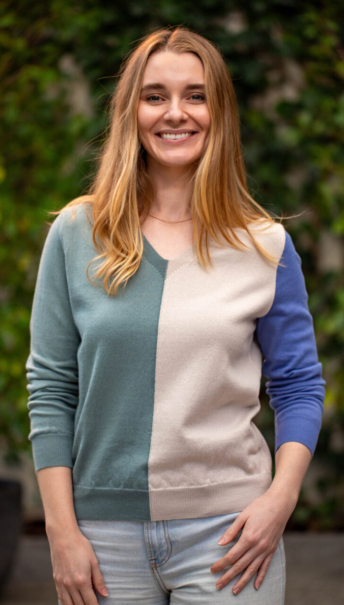 Woman wearing Country Laine - Cotton Harlequin Jumper (CL0098) in the colour Wild Sage/Sand/Blue Jay.