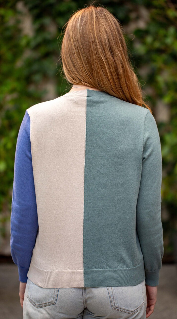Woman wearing Country Laine - Cotton Harlequin Jumper (CL0098) in the colour Wild Sage/Sand/Blue Jay.