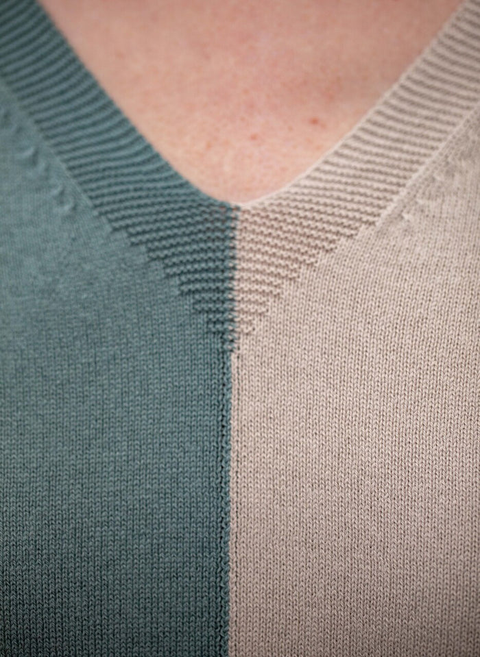 Woman wearing Country Laine - Cotton Harlequin Jumper (CL0098) in the colour Wild Sage/Sand/Blue Jay.