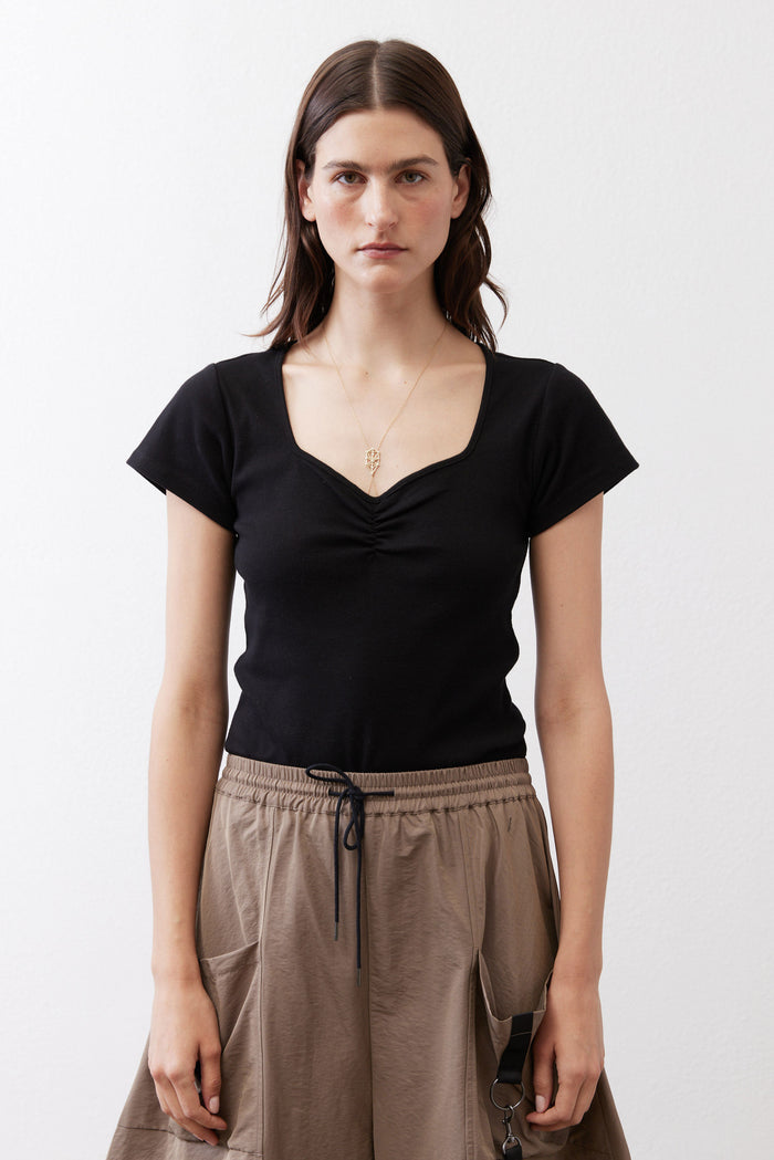 Black square-neck dipped front short-sleeve top with gathered neckline