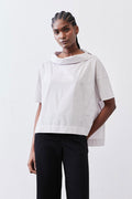 White dolman drape-neck top front view with relaxed short sleeves
