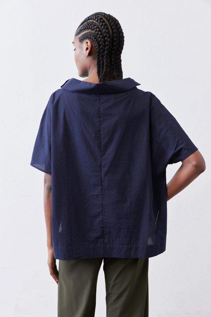 Dolman drape neck top in deep navy, back view with draped cowl neck and short sleeves