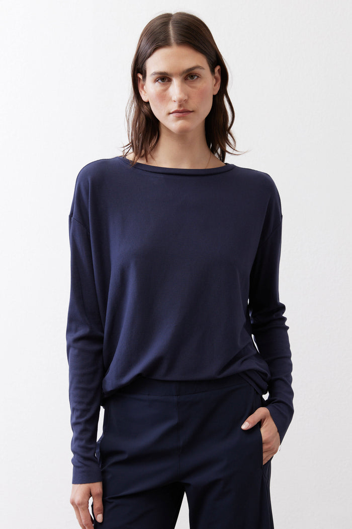 Deep navy long-sleeve top with round neckline and relaxed fit