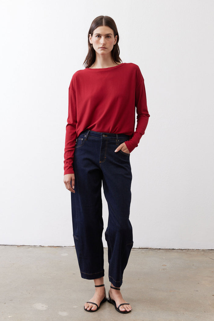 Garnet red long-sleeve crewneck top, relaxed fit with back buttons