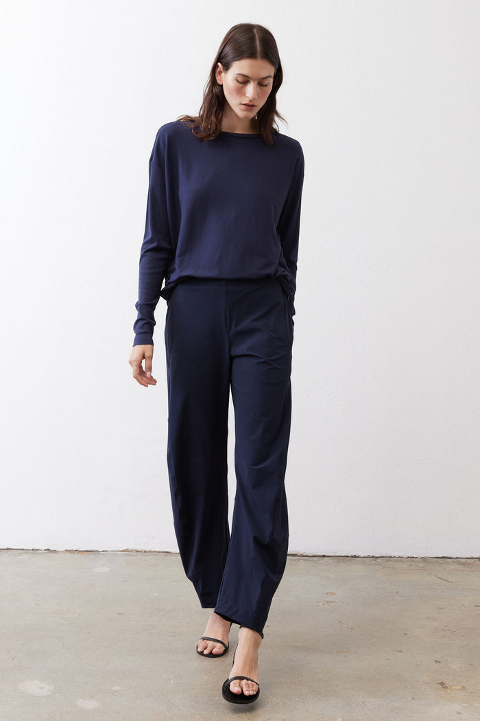 Deep navy long-sleeve top with round neckline and straight hem