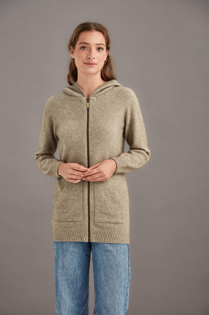 Woman wearing McDonald - Merino & Possum Stepped Stitch Hoodie (5063) in the colour Mocha.