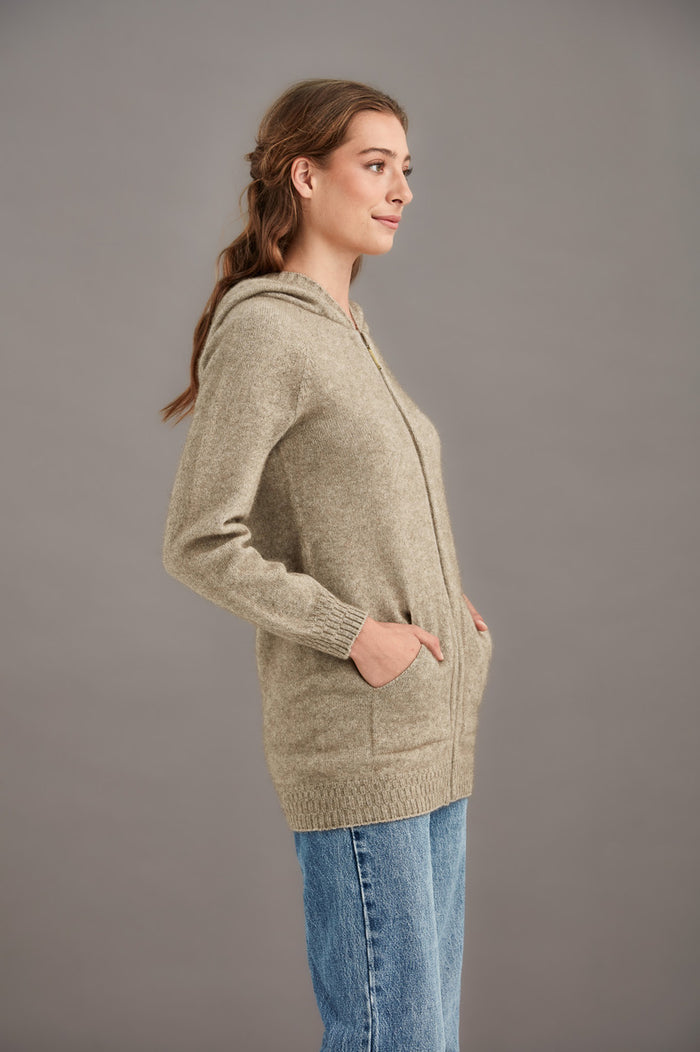 Woman wearing McDonald - Merino & Possum Stepped Stitch Hoodie (5063) in the colour Mocha.