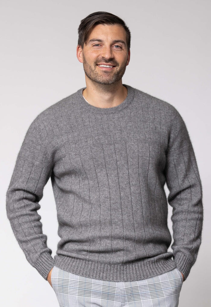Man wearing Noble Wilde - Merino & Possum Riverton Sweater (NW1101) in the colour Shale.
