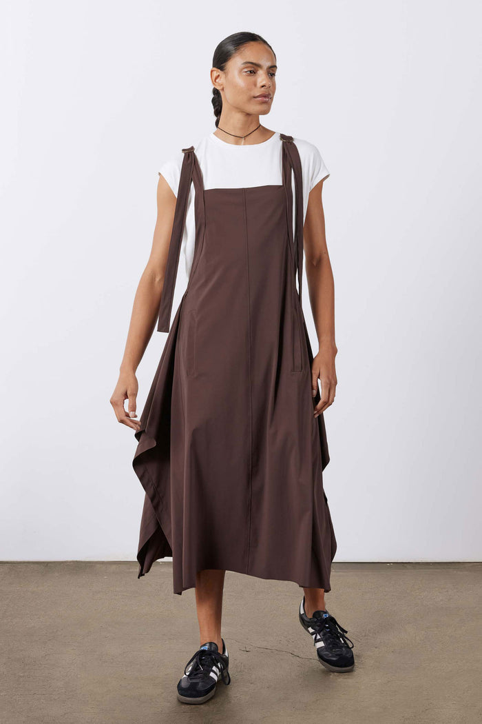 Coffee-brown sarafan dress on model, sleeveless with draped side panels