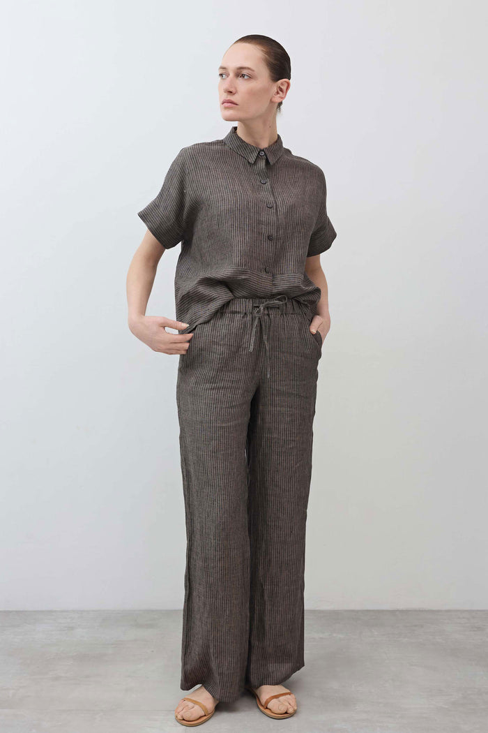 Charcoal striped wide-leg linen pants with drawstring waist, full front view