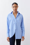 Front view of light blue striped button-down shirt with pointed collar