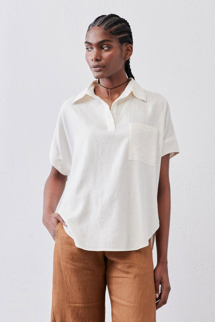Vintage white linen pullover blouse with short sleeves, point collar, and chest patch pocket