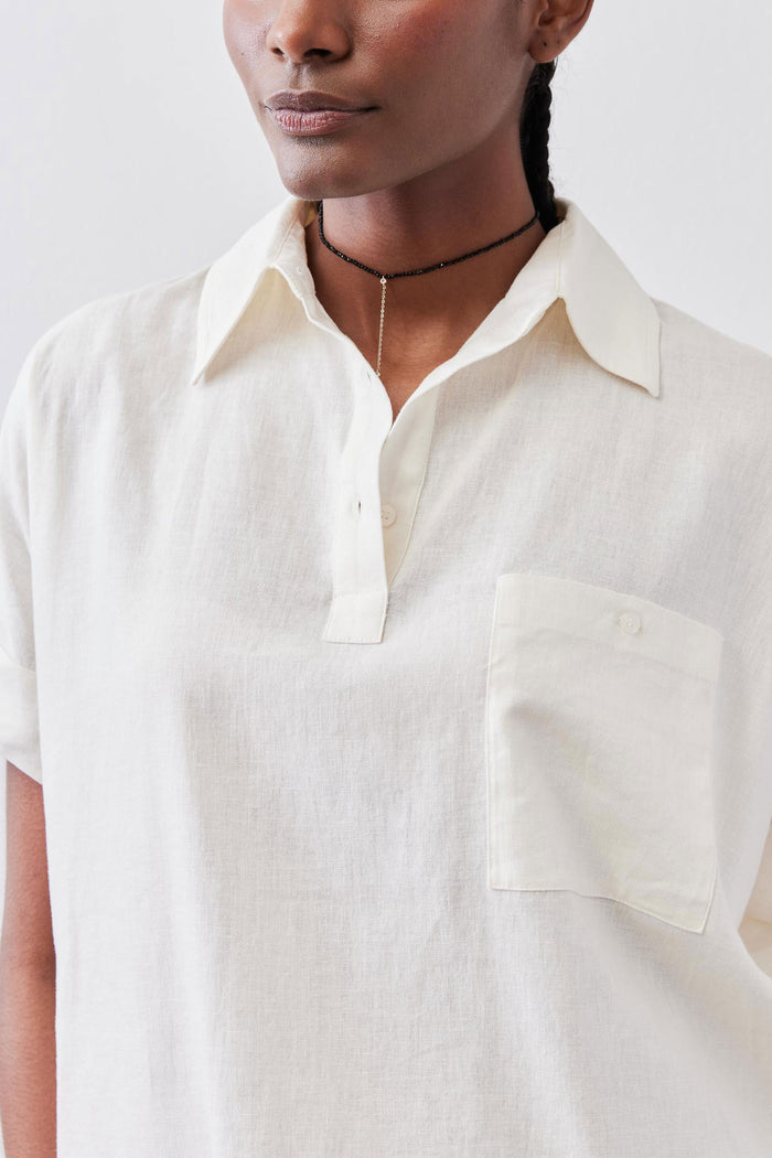Vintage white linen pullover blouse with open neckline and chest patch pocket