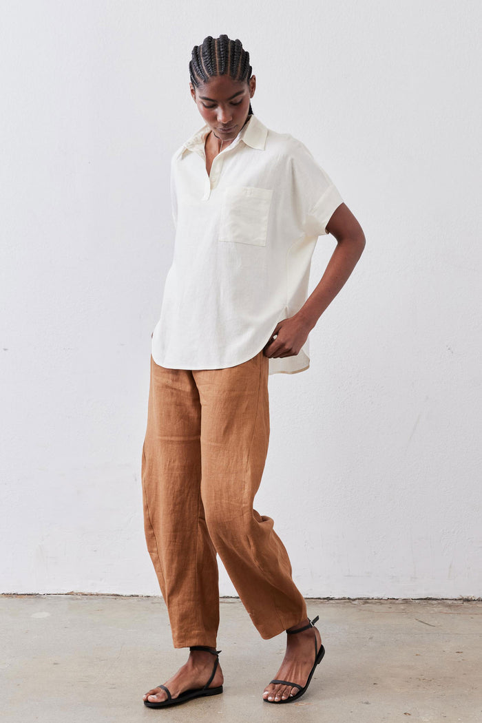 Vintage white linen pullover blouse with short sleeves, point collar, and chest patch pocket