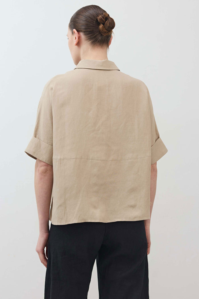 Oversized pullover blouse in feather gray, back view with short sleeves