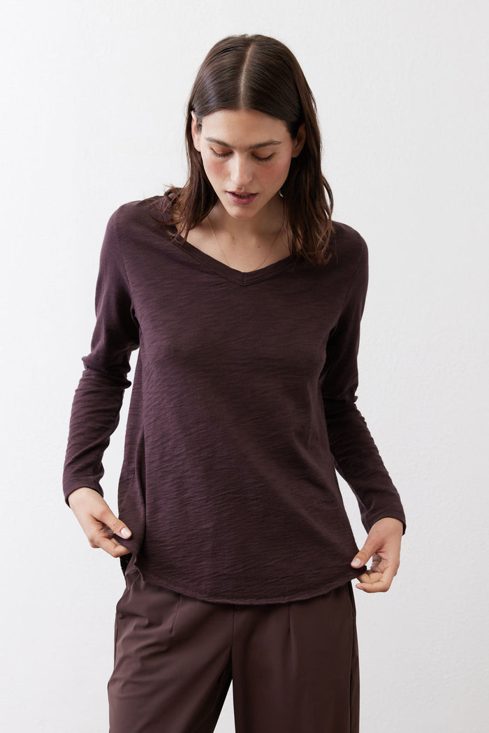 Coffee-brown V-neck swing top with long sleeves and straight hem
