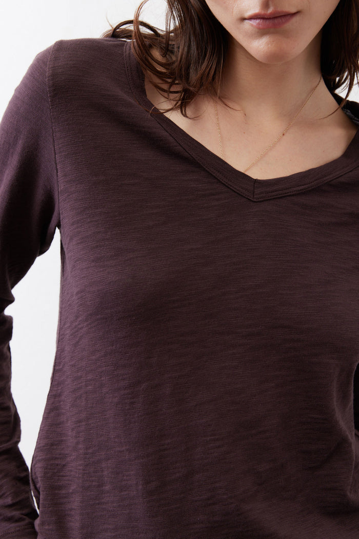 Coffee-brown V-neck swing top close-up of neckline and fabric texture