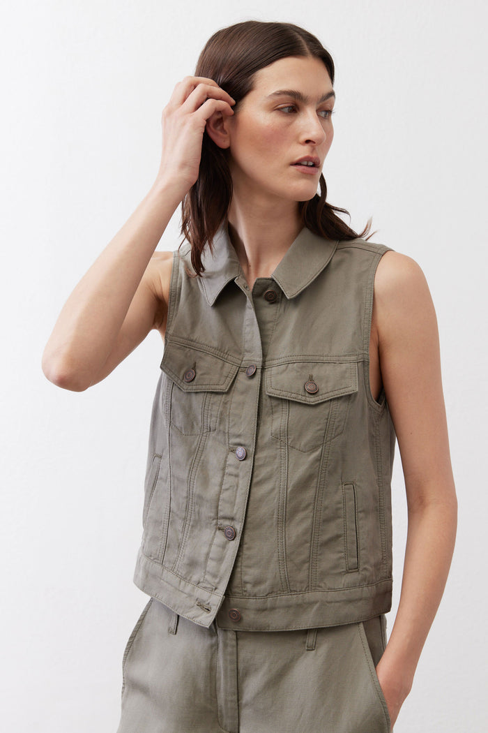 Olive cropped task vest with pointed collar, button front, and flap pockets
