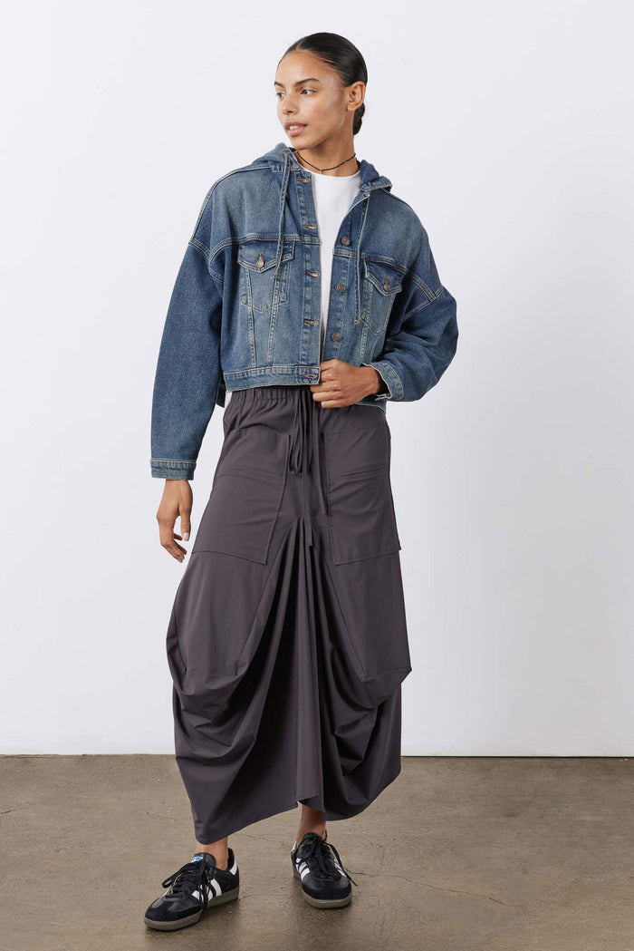 Washed denim jacket with hood, button front, chest pockets, slightly cropped fit