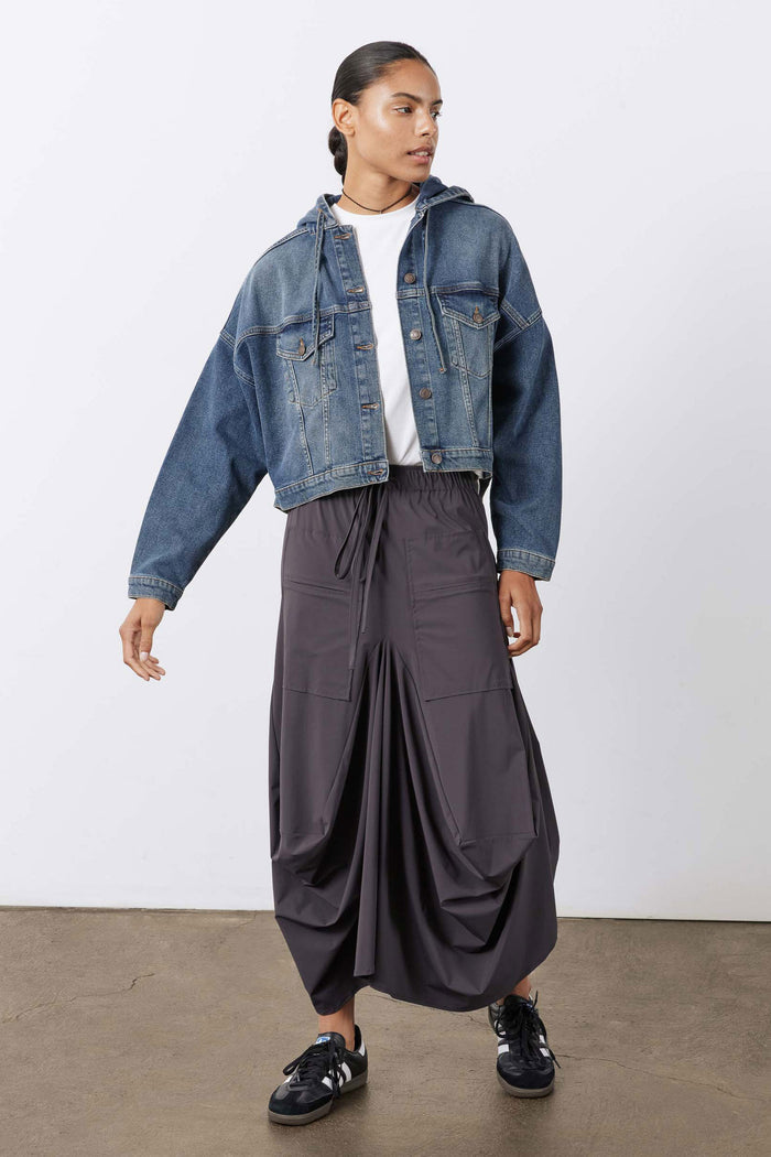 Washed denim jacket with hood, button front, chest pockets, relaxed straight hem