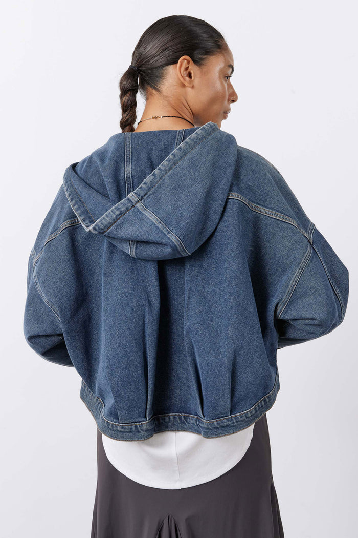 Washed denim hooded jacket with back yoke and seam stitching