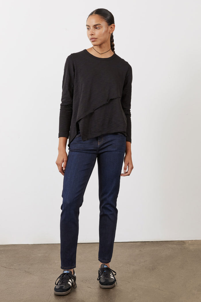 Dark blue fitted jeans with slim straight legs, front button closure, five-pocket design