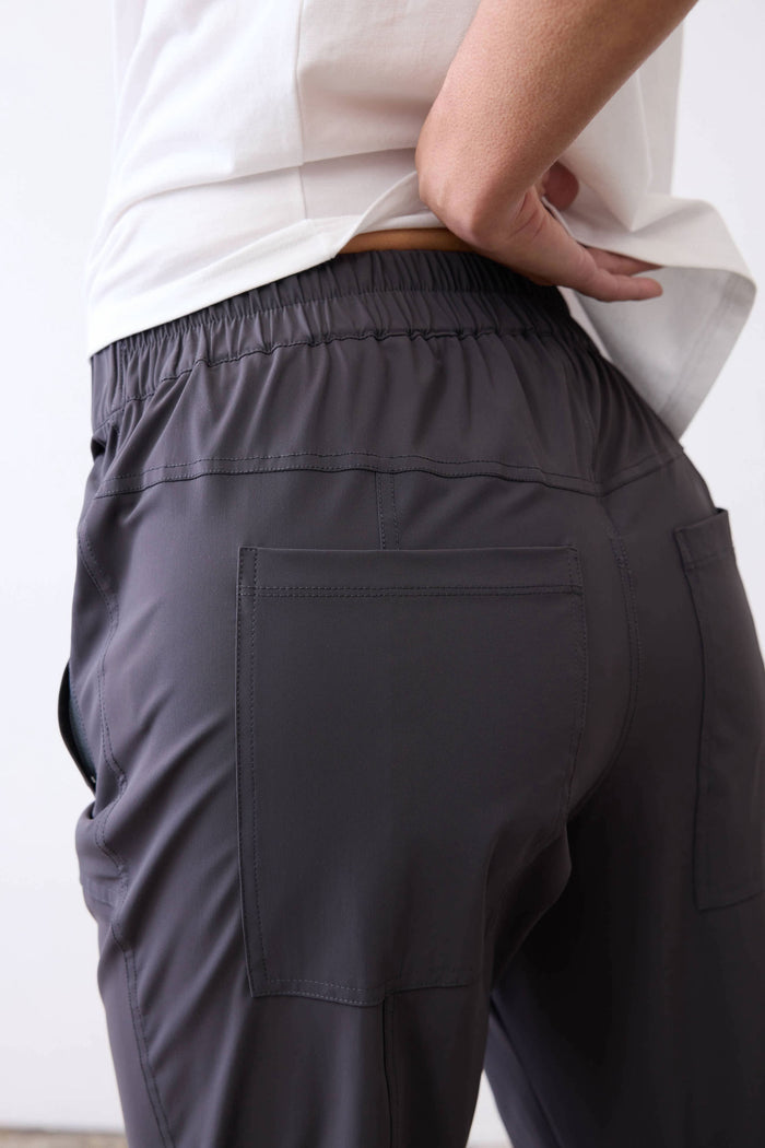 Graphite active pants with elastic waistband and zip fly detail