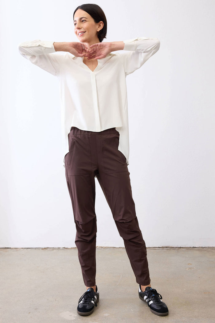 Coffee brown tapered pants with elastic waistband and side pockets, full view
