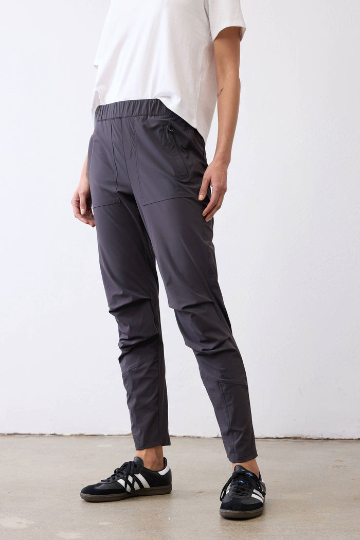 Graphite active pants with cargo-style side pockets and tapered leg