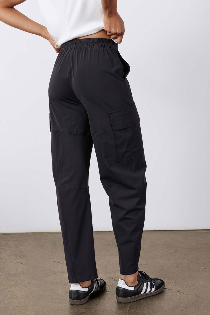 Black utility cargo pants with elastic waistband, cargo pocket detail, cuffed hem