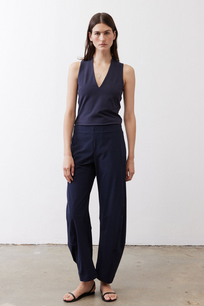 Loose-fit dark navy work pants with relaxed, slightly tapered legs