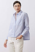 Light blue striped oversized button-down shirt with chest pocket and button front