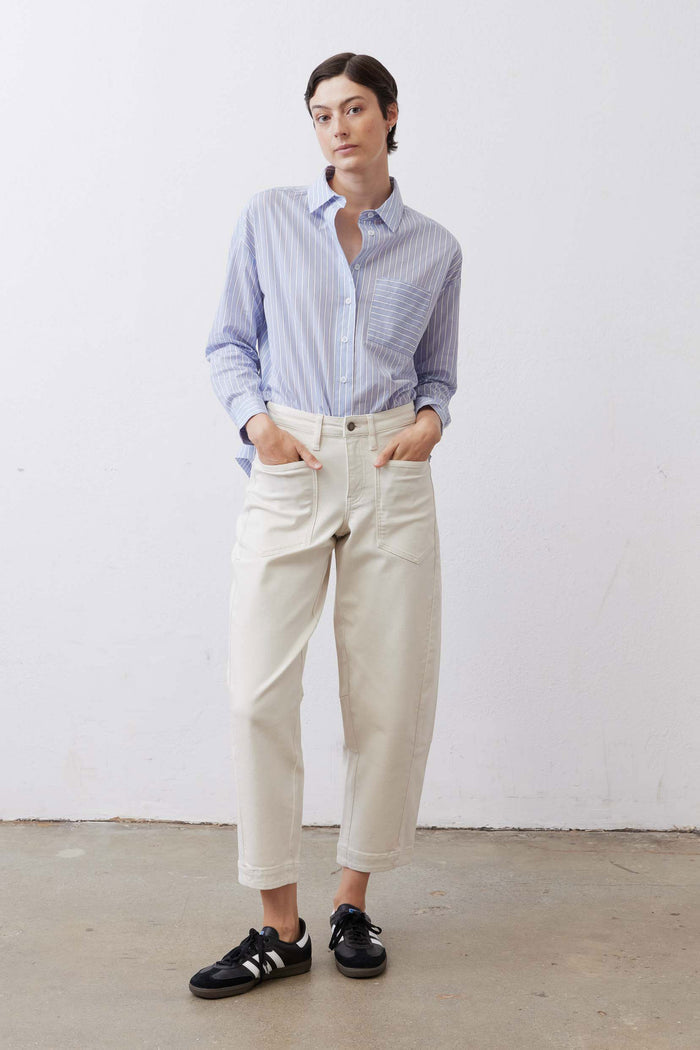 Light blue and white striped oversized button-down shirt with long sleeves