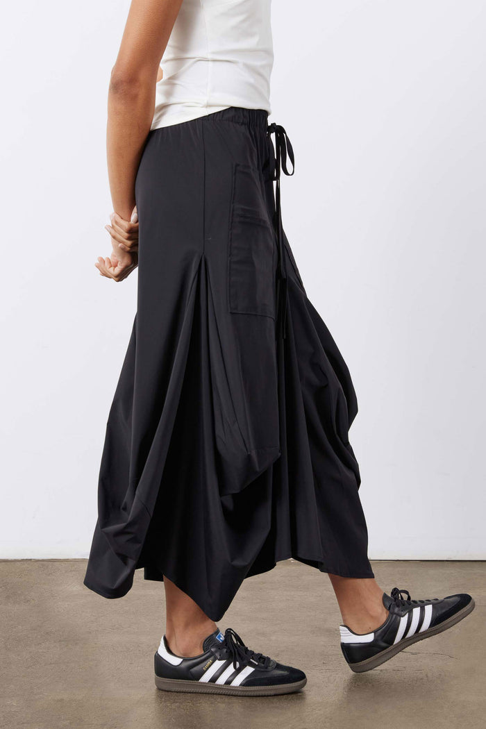 Black midi skirt with adjustable drawstring and gathered, layered skirt layers