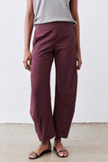 Aubergine work pants with relaxed wide-leg silhouette and elastic waist, ankle-length hem
