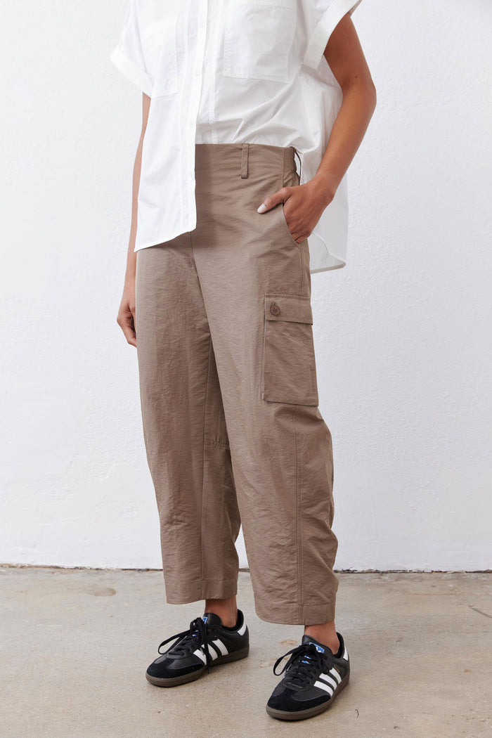 Taupe-brown cargo barrel pants with flap side pocket and cuffed ankle hem