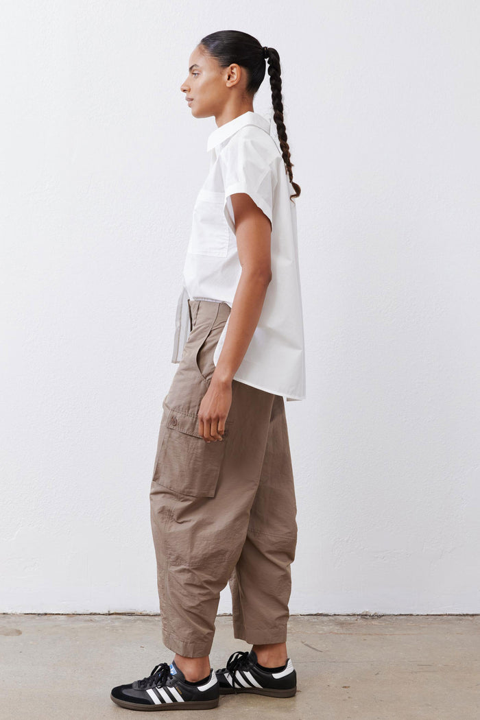 Walnut-brown relaxed cargo barrel pants with side cargo pockets, cuffed hems