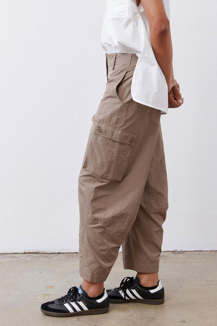 Taupe-brown cargo barrel pants with side patch pocket and cuffed ankle hem