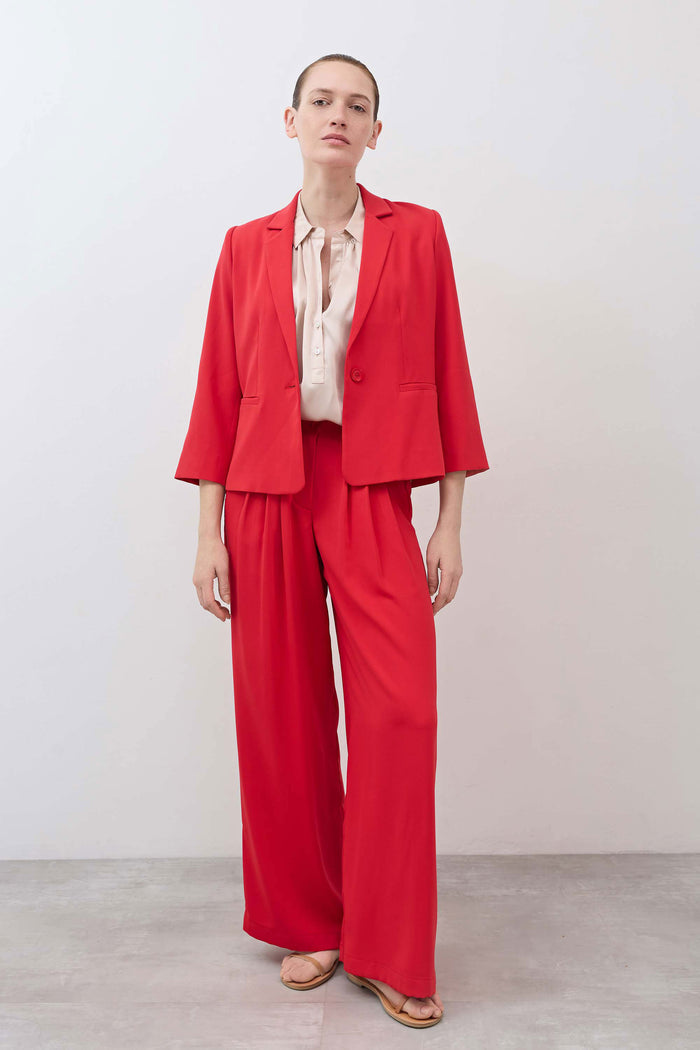 Blush satin silk blouse with spread collar and button-front, short sleeves