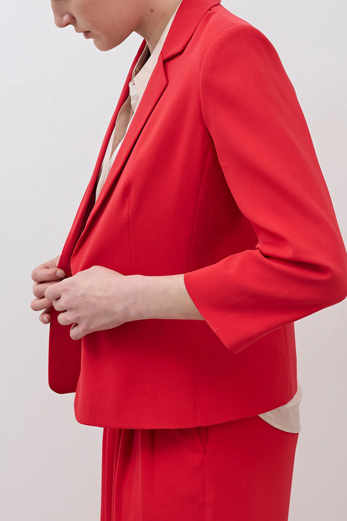 Tomato red blazer with three-quarter sleeve and single breast pocket
