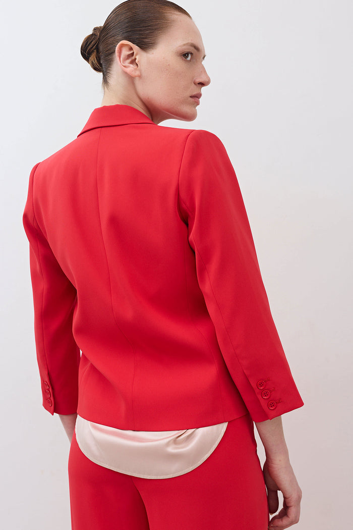 Tomato red cropped blazer back with single button cuff detail