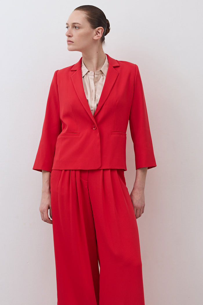 Tomato red cropped blazer with notched lapel and three-quarter sleeves