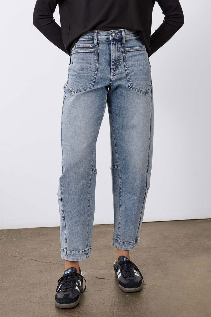 Light blue vintage-wash slouchy jeans with front pockets and zip fly