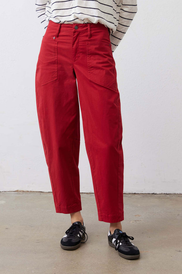 Scarlet twill pants, side view, belted waist with button fly and cargo-style pockets