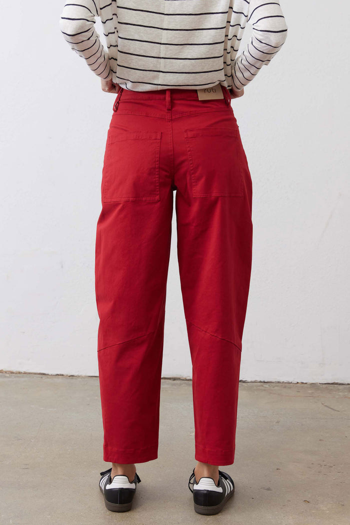 Scarlet twill pants, front view, belted waist with button fly and deep front pockets