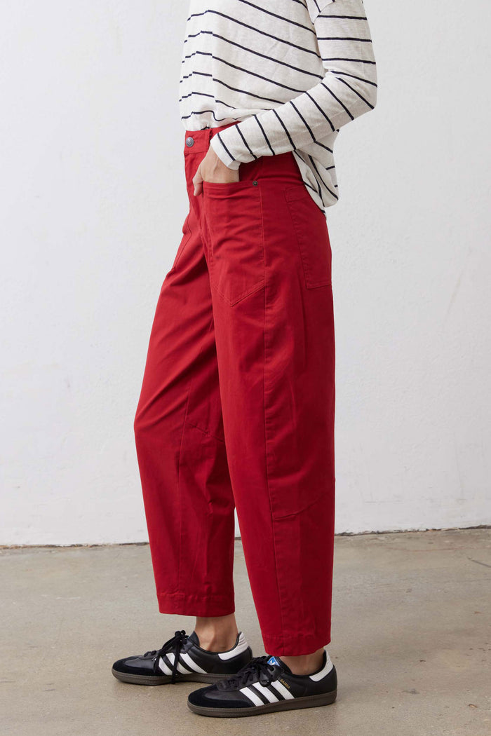 Scarlet twill pants with relaxed legs, side pockets, and cuffed hem