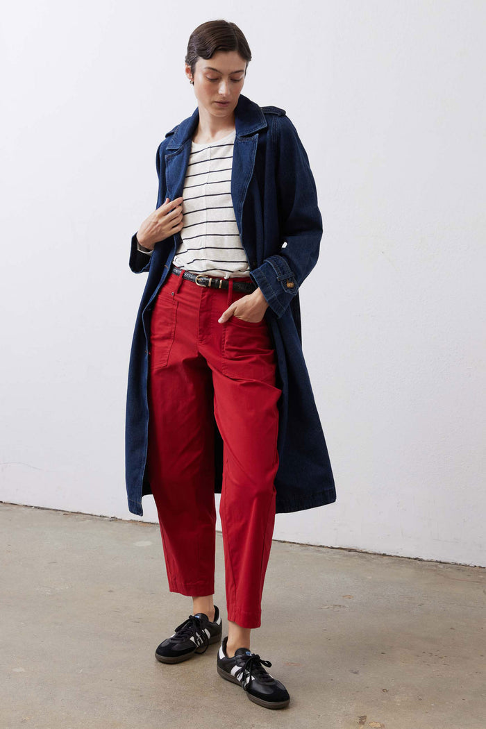 Scarlet slouchy twill pants with belt loops and cuffed hem, styled with sneakers