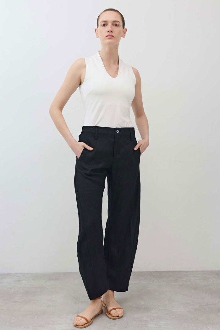 Black linen loose pants with elastic waist and relaxed wide-leg silhouette