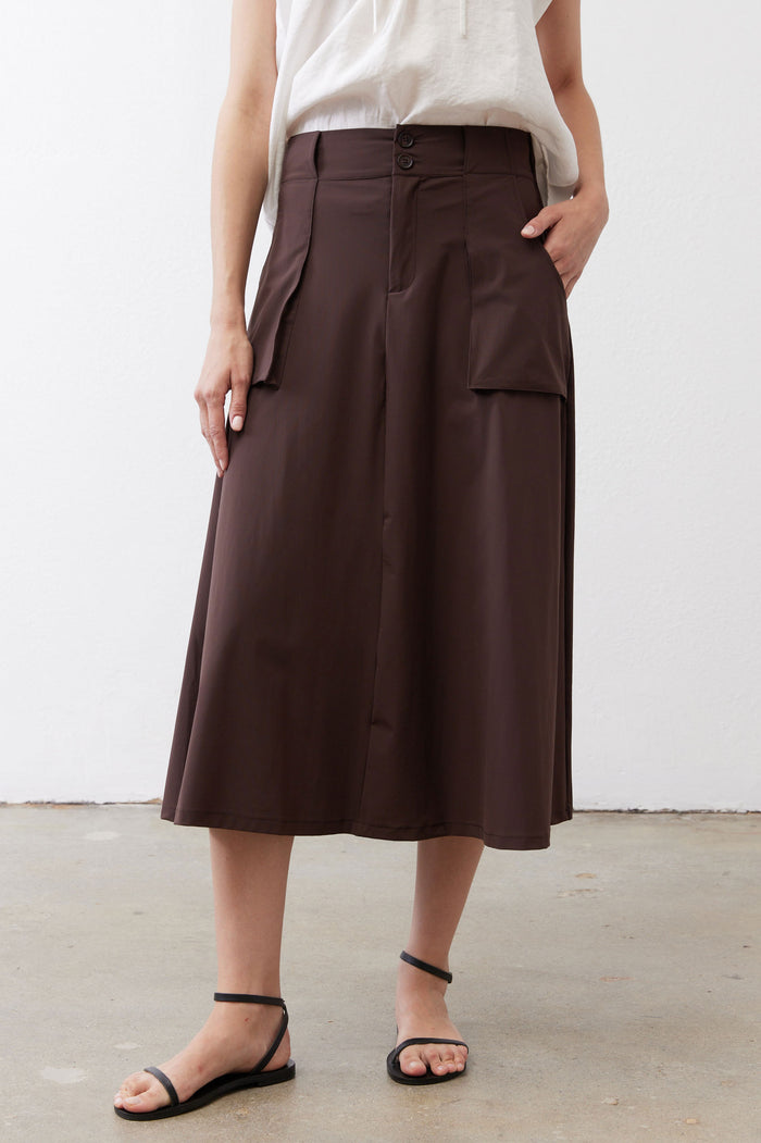 Coffee-brown utility midi skirt close view of waistband and side cargo pocket